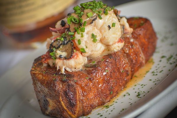 Steak topped with shrimp